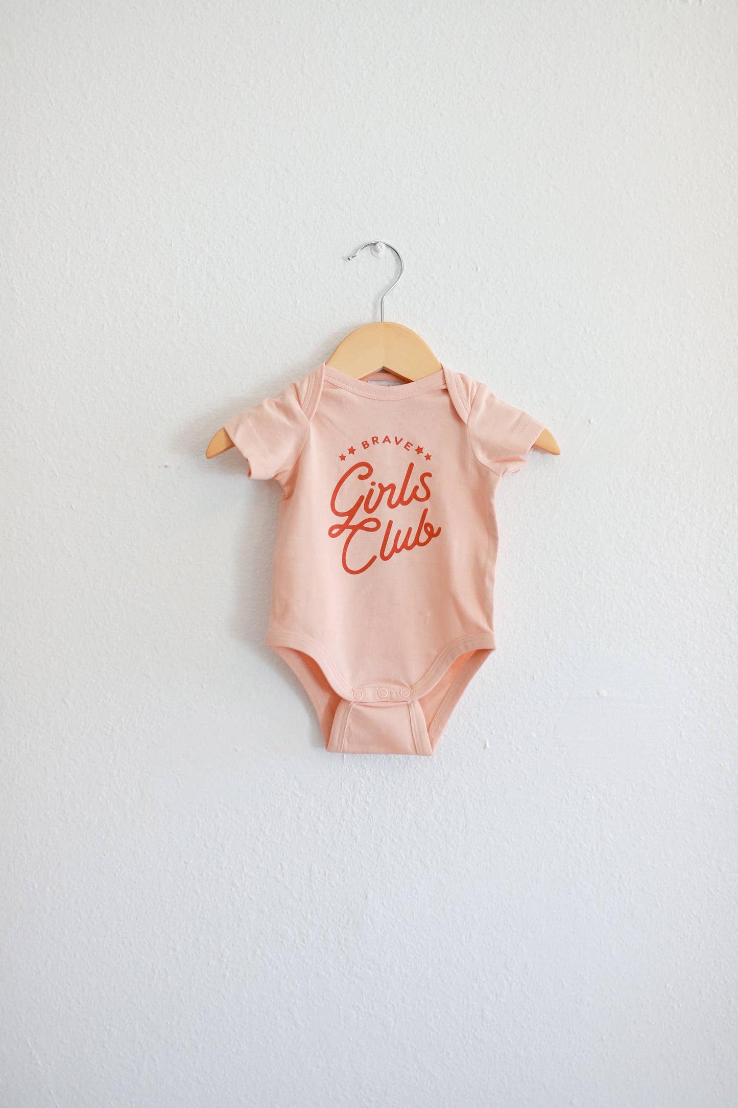Brave Girls Club Baby Onesie