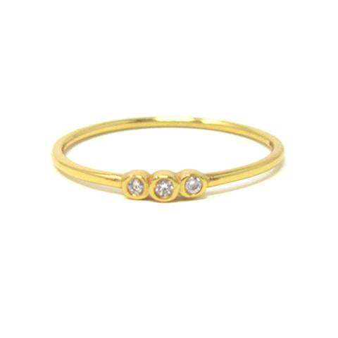 yellow gold three stone ring with cubic zirconia