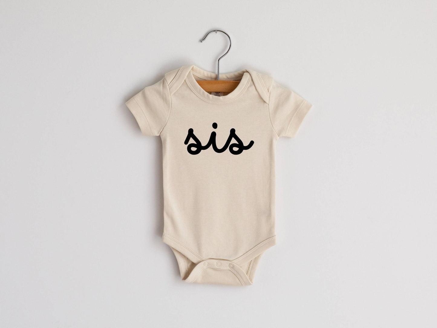 Cream Sis Script Baby Onesie