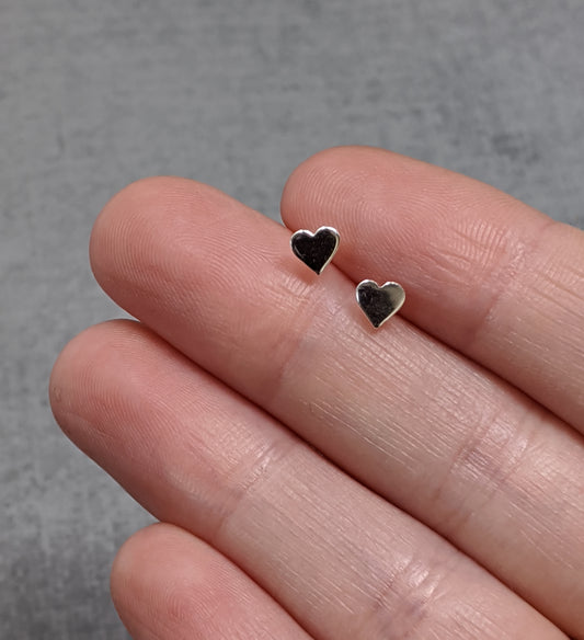 Sterling silver tiny heart studs