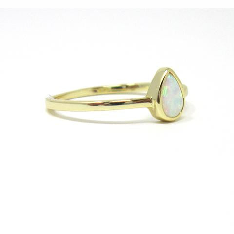 Yellow gold pear opal ring
