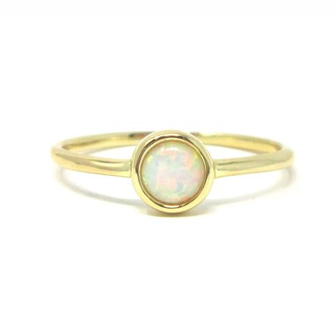 Yellow gold round opal ring