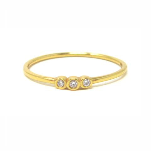yellow gold three stone ring with cubic zirconia